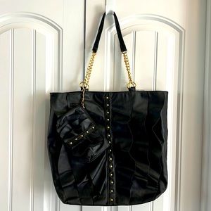 Fun black pleather with gold accent ruffle bag